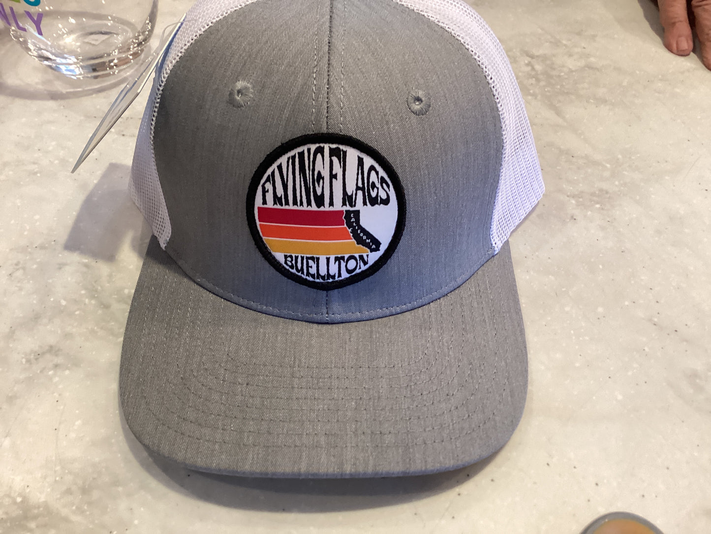 Flying flags CA Buellton trucker hat